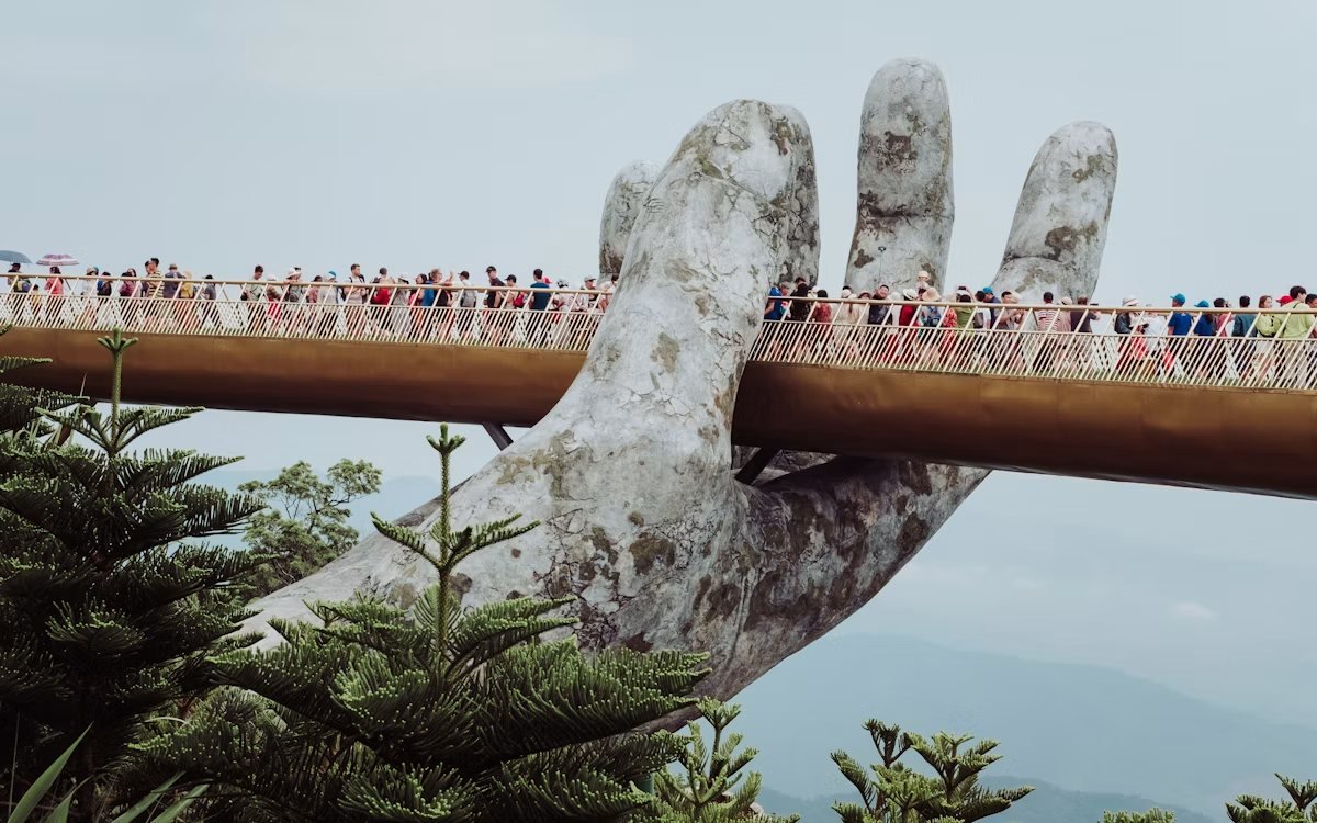 The Golden Bridge held by giant stone hands above Da Nang