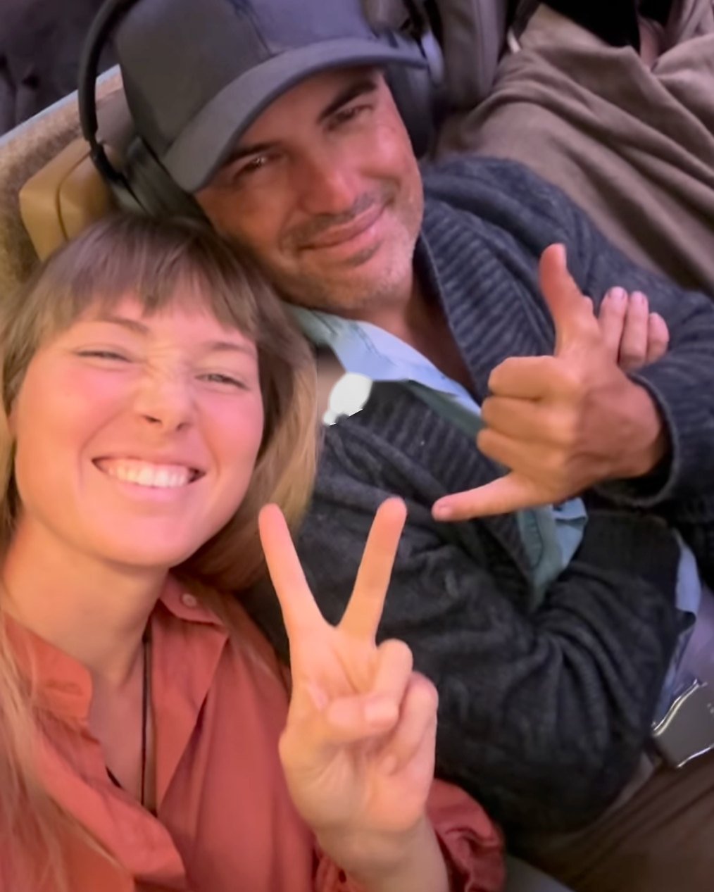 Chanelle and Damien on the plane, taking off to Vietnam